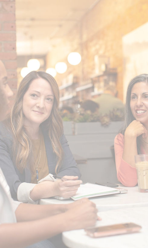 stock image of women having a meeting in a warm, cozy environment